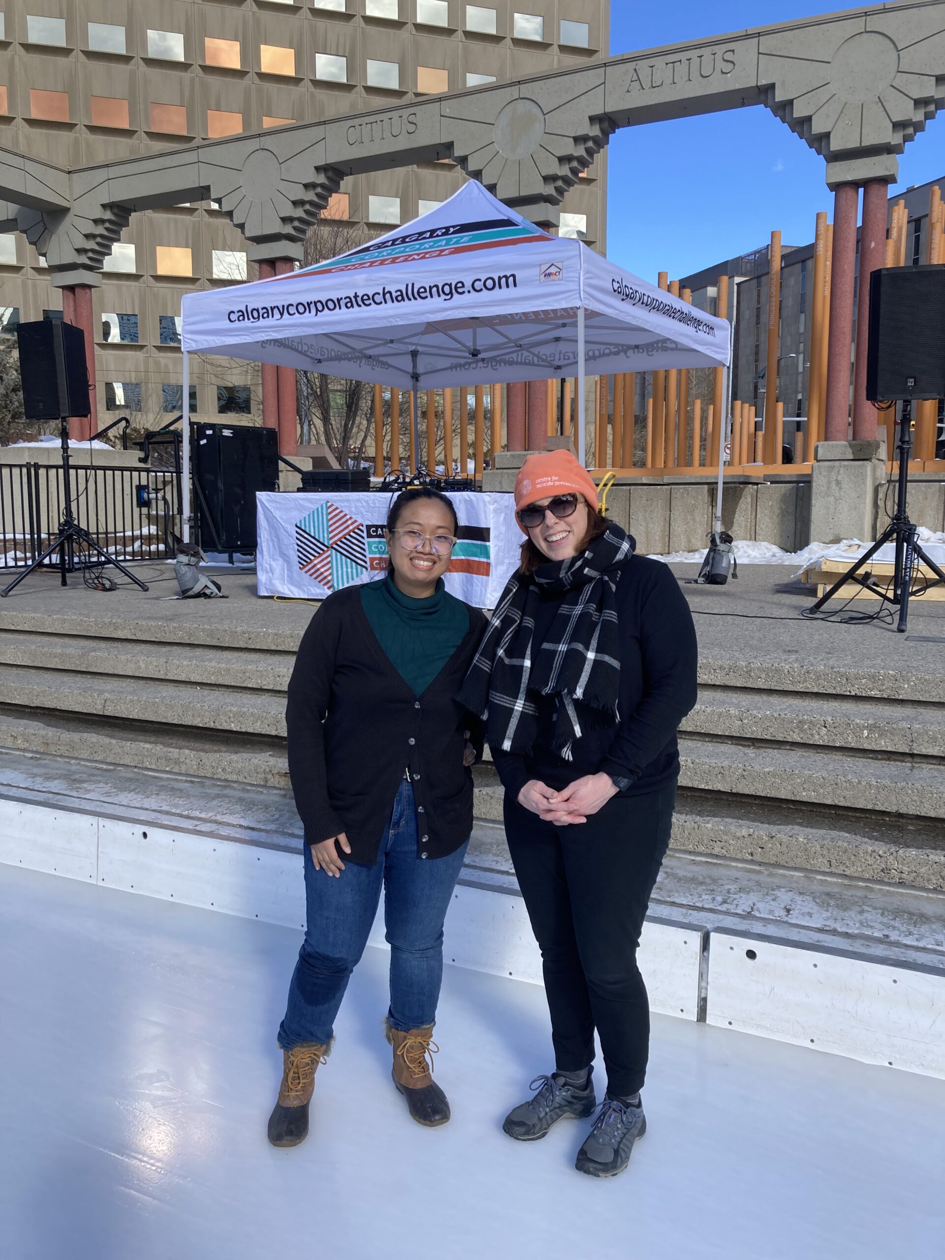 Freshia Corpus (left) and Hilary Sirman (right) at the human bonspiel event for CCC at Olympic Plaza.